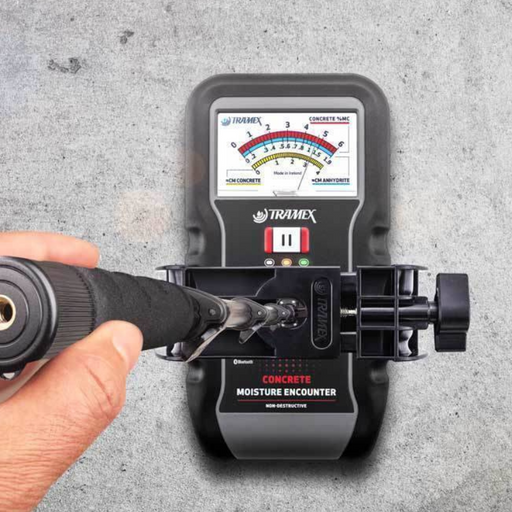 Tramex Extension Handle - E5-HBS A sturdy extension handle with a black and silver clamp, designed to securely attach to measuring devices, set against a concrete floor background.