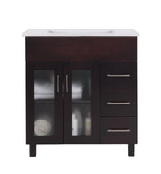 Dark brown vanity with white countertop.
