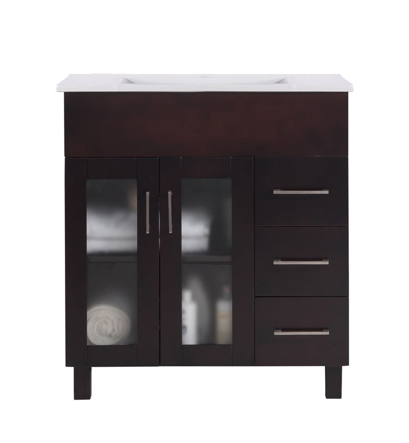 Dark brown vanity with white countertop.

