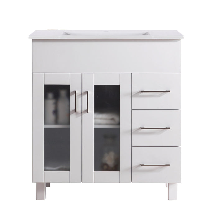 White bathroom vanity with three drawers and two glass-paneled doors.
