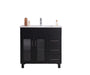 Bathroom vanity with white countertop, black cabinet, three drawers, and two glass-paneled doors.