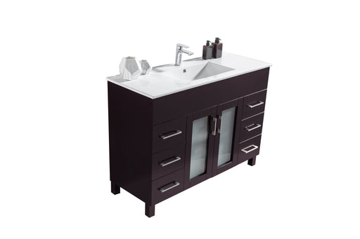 Dark brown bathroom vanity with a white countertop.
