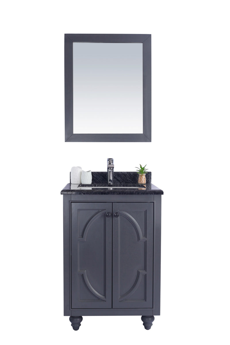 Gray vanity with mirror and dark countertop.