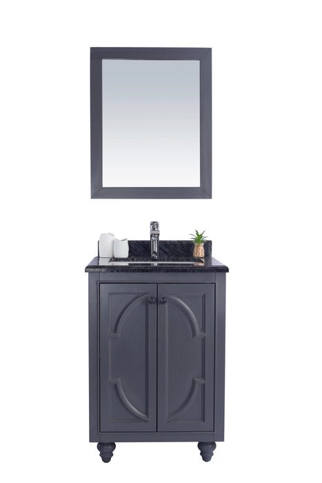 Gray vanity with mirror and dark countertop.