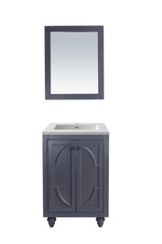 Bathroom vanity with sink and matching mirror.
