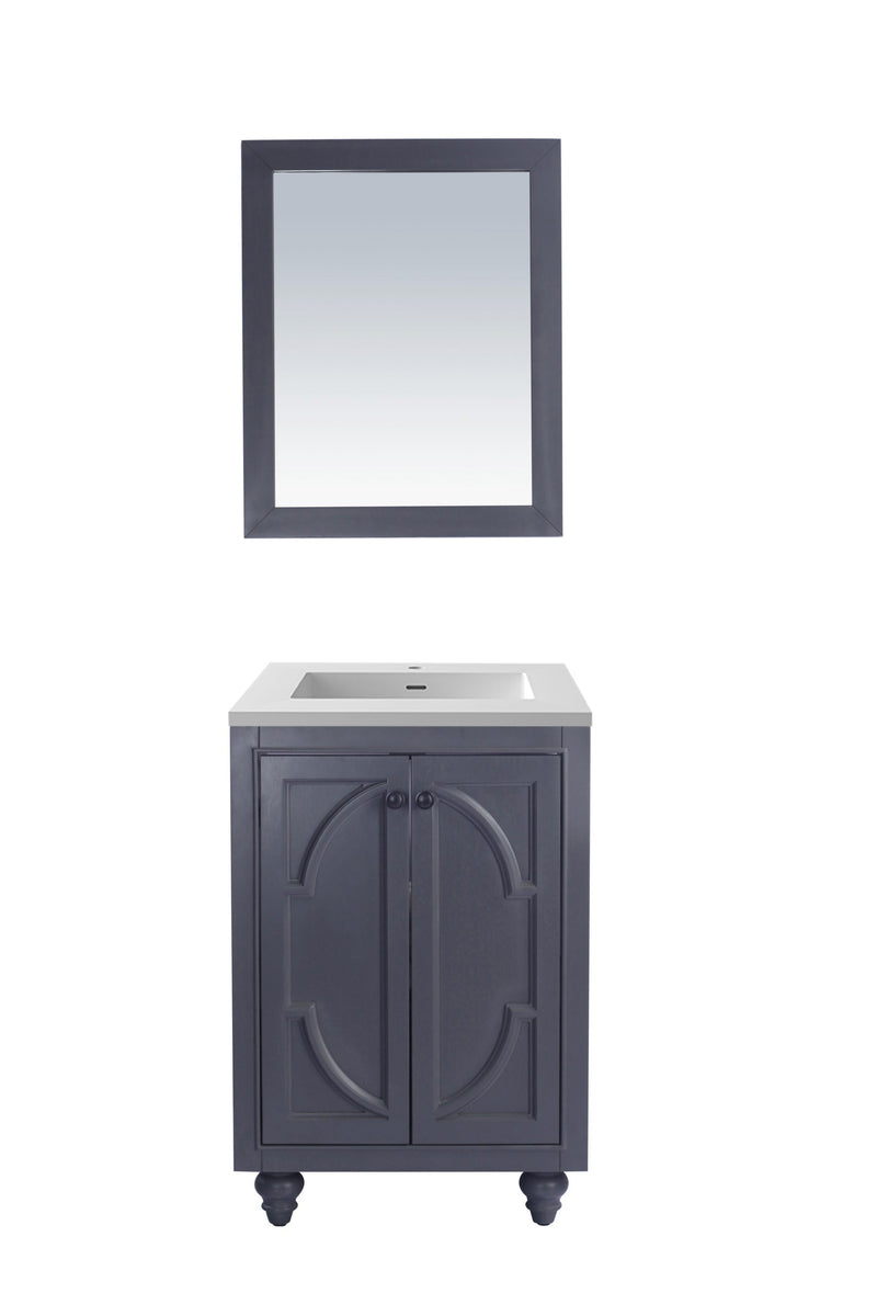 Bathroom vanity with sink and matching mirror.