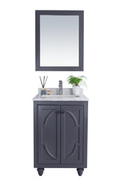 Gray vanity with marble countertop and mirror.