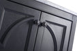 Dark gray cabinet with arched trim and round knobs.