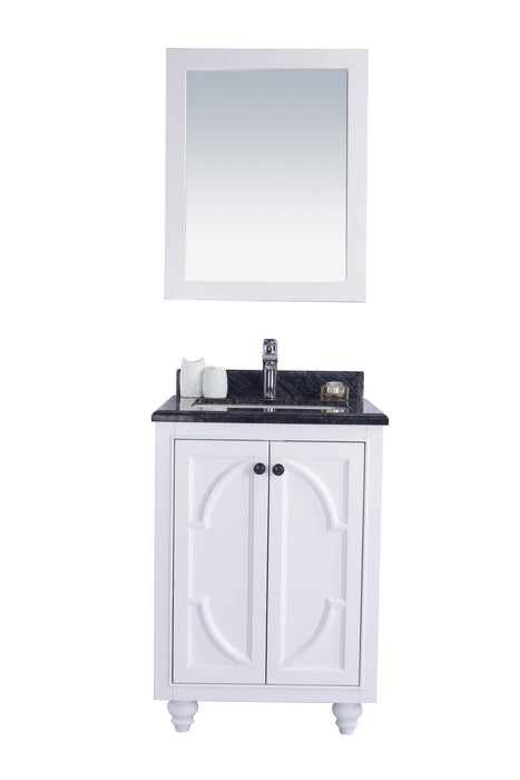 White bathroom vanity with mirror and black marble top.