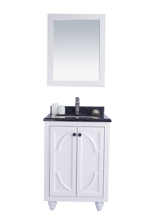 White bathroom vanity with mirror and black marble top.