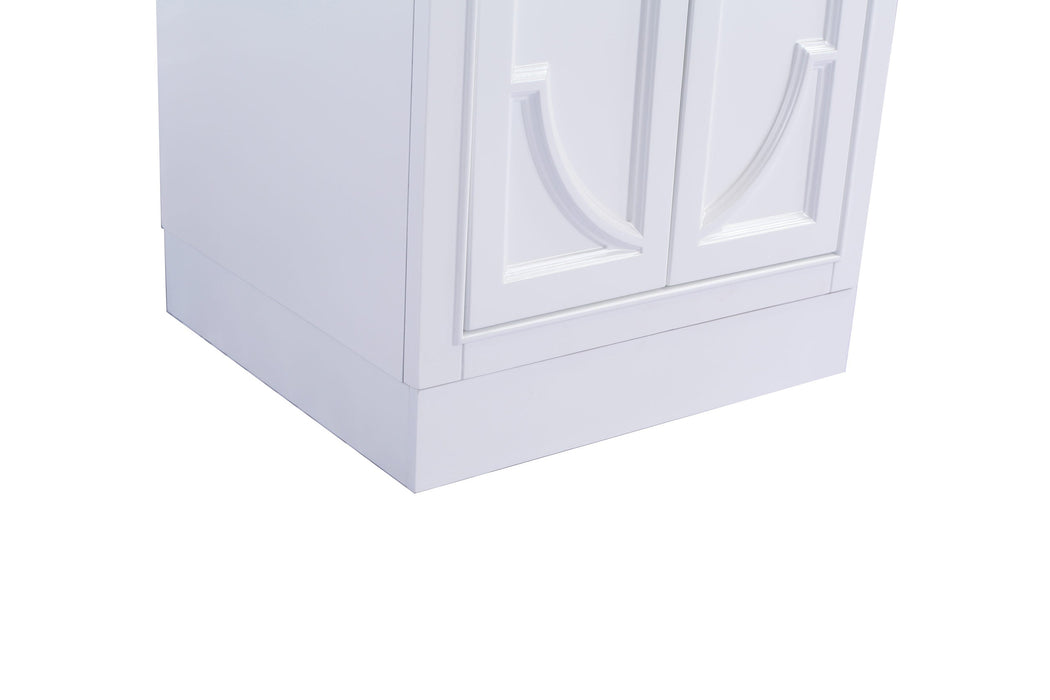 White cabinet with paneled doors.