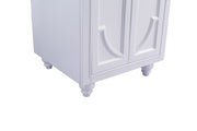 White vanity cabinet with ornate door panels and rounded legs.
