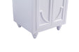 White vanity cabinet with ornate door panels and rounded legs.
