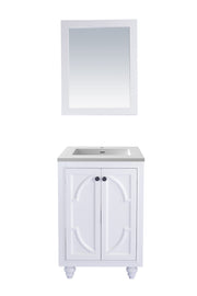 White bathroom vanity and mirror.