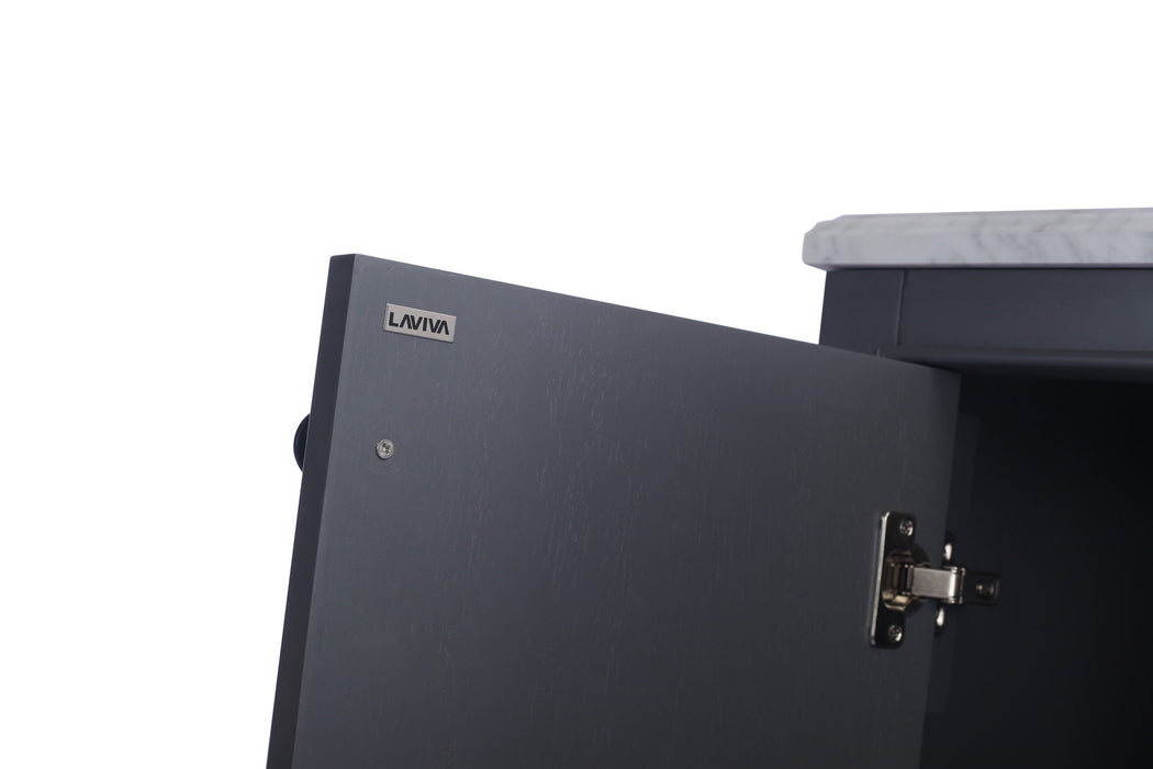 Close-up of a gray cabinet door with a silver Laviva logo and a hinge.