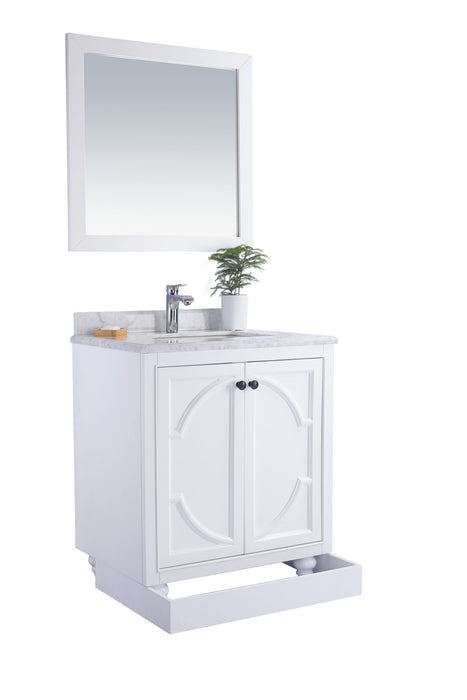 White bathroom vanity with a marble countertop, mirror, and cabinet doors.