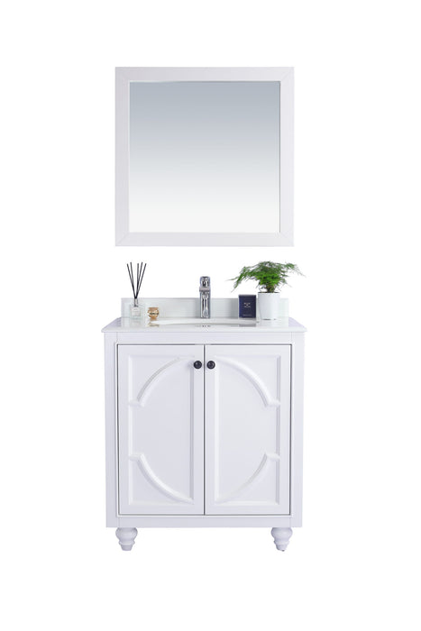 White bathroom vanity with mirror.