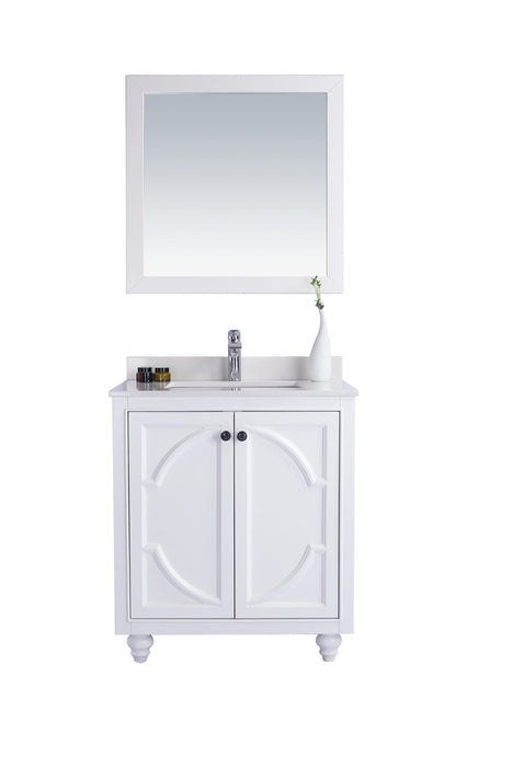 White bathroom vanity with mirror.