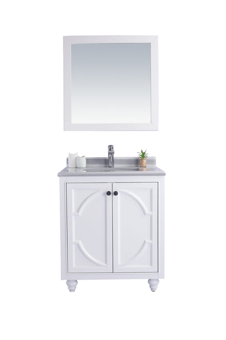 White bathroom vanity with mirror.