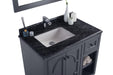 Bathroom vanity with granite top, sink, and storage.
