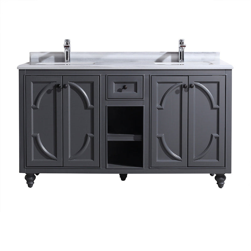 Bathroom vanity with marble top, two sinks, gray cabinets, decorative doors, and shelves.