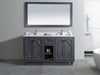 Gray bathroom vanity with marble countertop, double sinks, matching mirror, in a tiled bathroom.