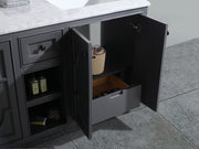 Open gray bathroom vanity with marble countertop, drawer, and shelf.