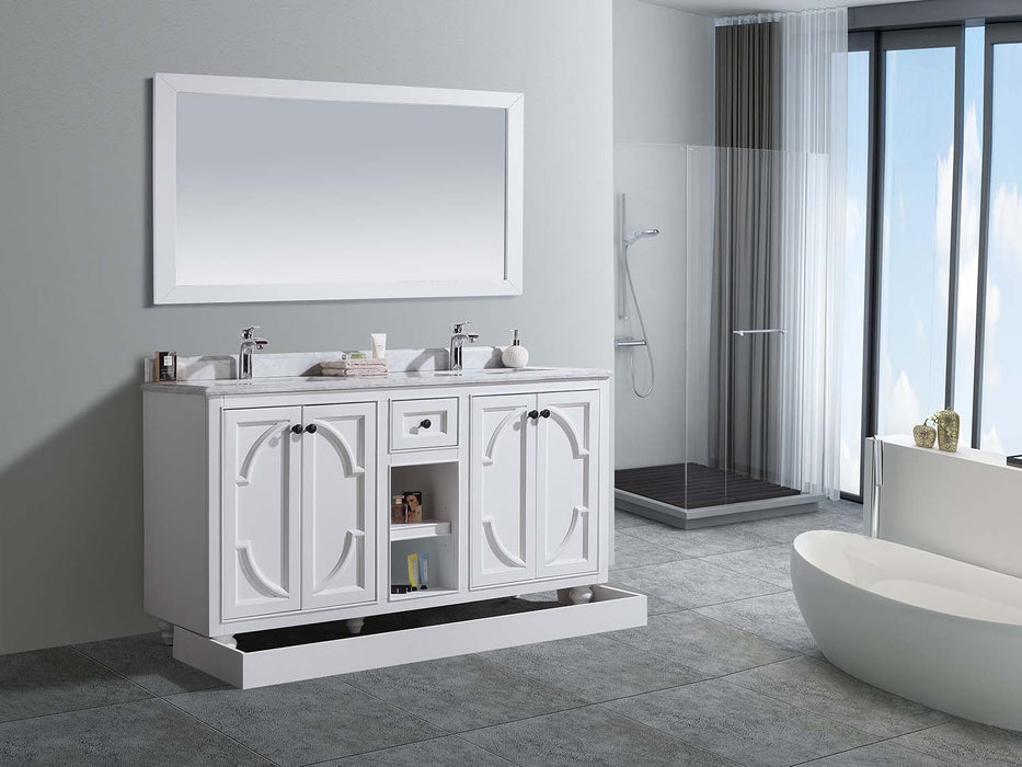 White bathroom vanity with double sinks and large mirror.