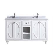 White vanity with marble countertop and two sinks.