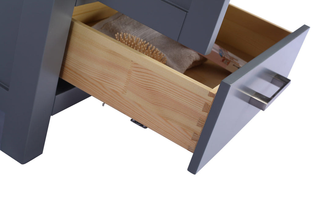 Open gray vanity drawer with wooden interior and contents.