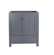 Gray bathroom vanity with brushed metal hardware.