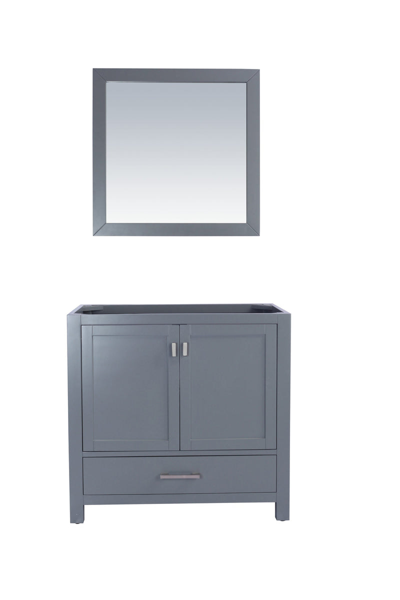 Gray bathroom vanity with a mirror.