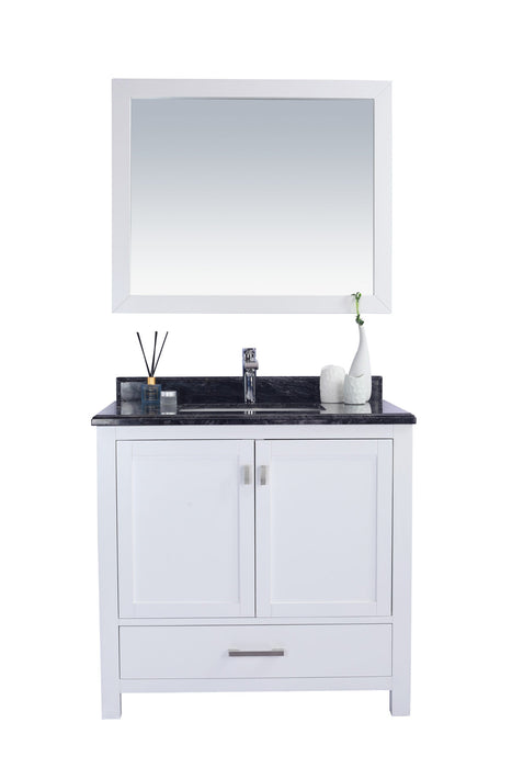 White vanity with black marble top and white mirror.