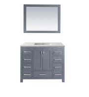 Gray bathroom vanity with white countertop and mirror.