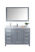 Gray vanity cabinet with white marble countertop and framed mirror.