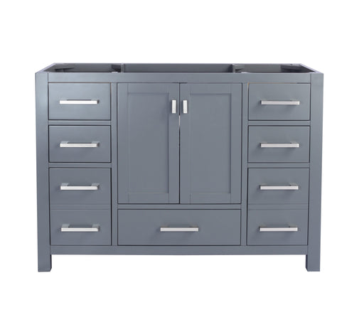 Gray bathroom vanity with drawers and cabinet.
