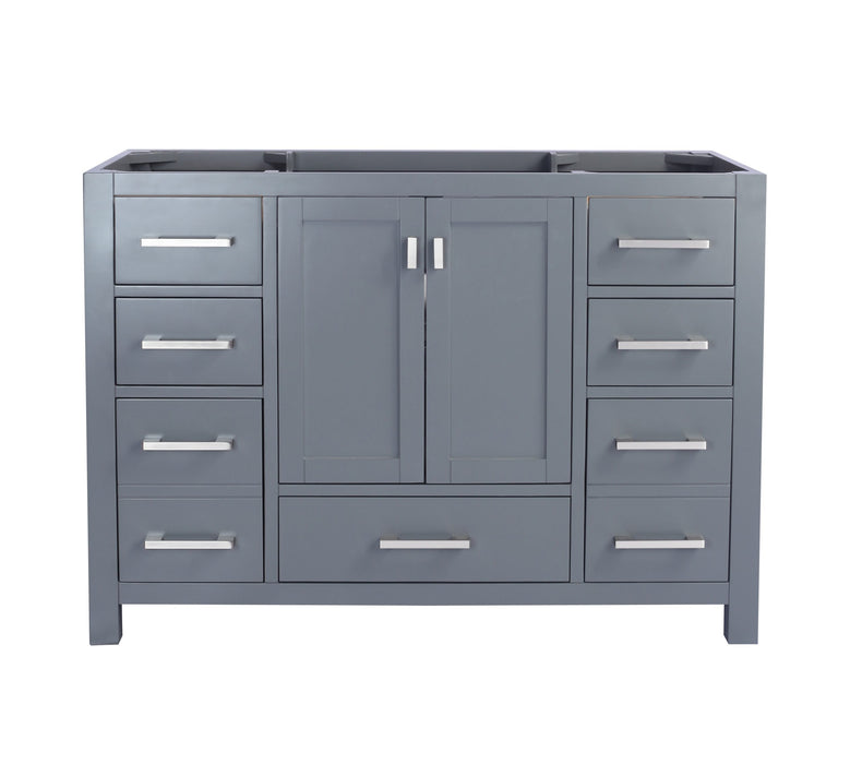 Gray bathroom vanity with drawers and cabinet.