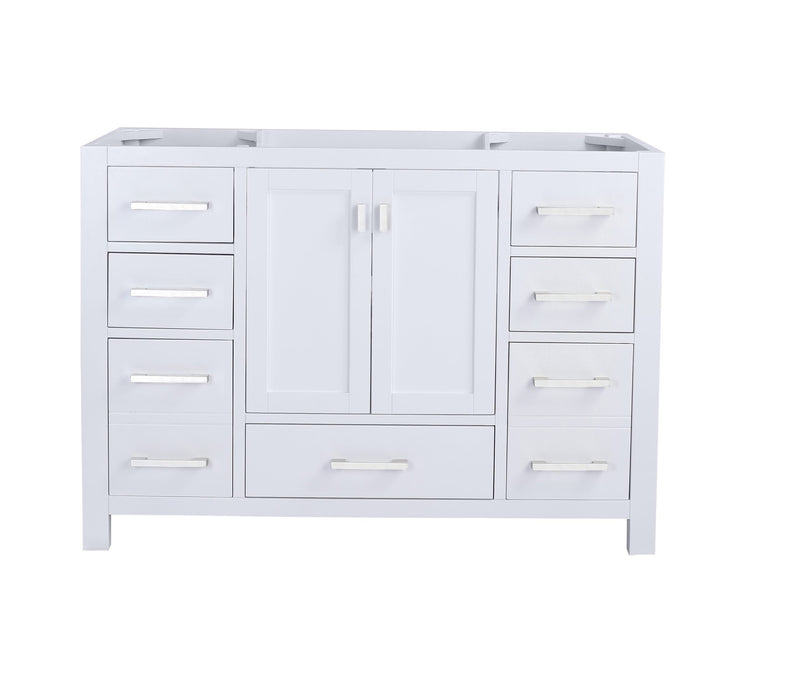 White bathroom vanity with drawers and cabinet doors.