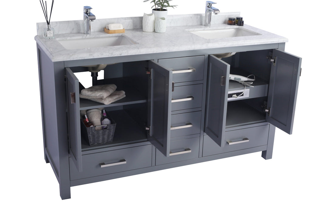 Gray double vanity with open cabinet doors, marble top, and nickel hardware.