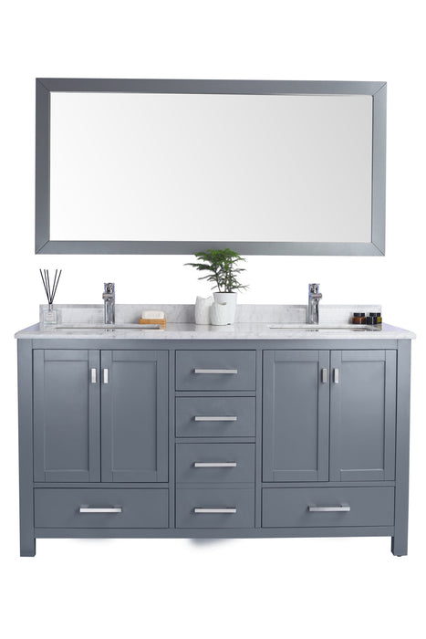 Bathroom vanity with marble top and mirror.
