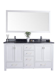White double vanity with black countertop and rectangular mirror.