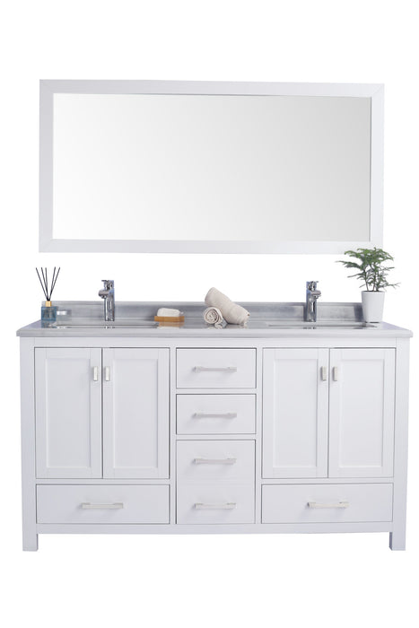 White bathroom vanity with a large mirror above.
