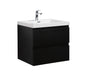 Black bathroom vanity with white sink and chrome faucet.
