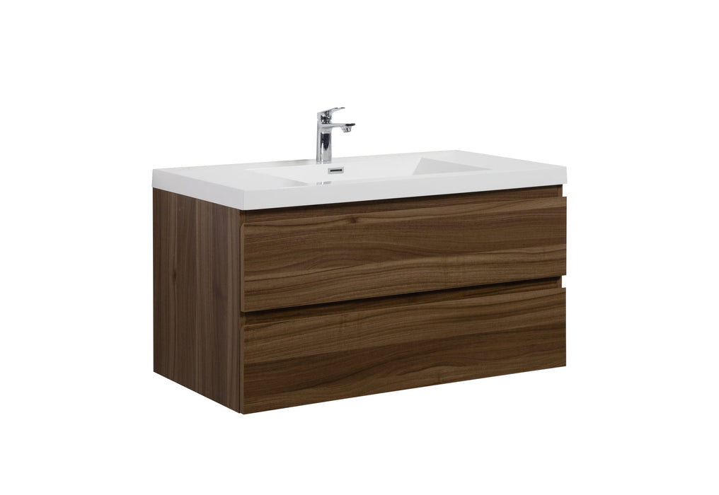 A bathroom vanity with a white countertop and wood-grain drawers.