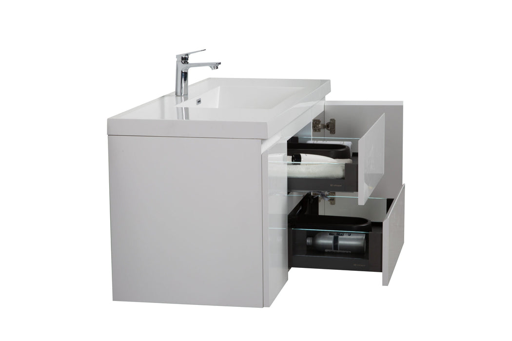 White bathroom vanity with open drawers.