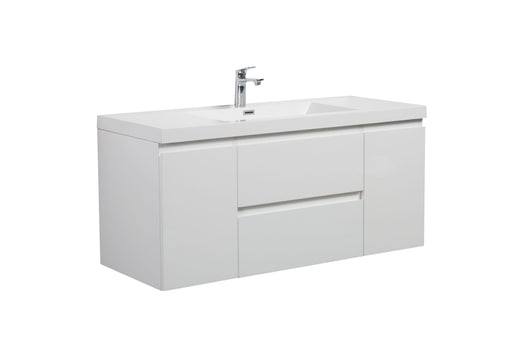 White bathroom vanity with built-in sink and chrome faucet.
