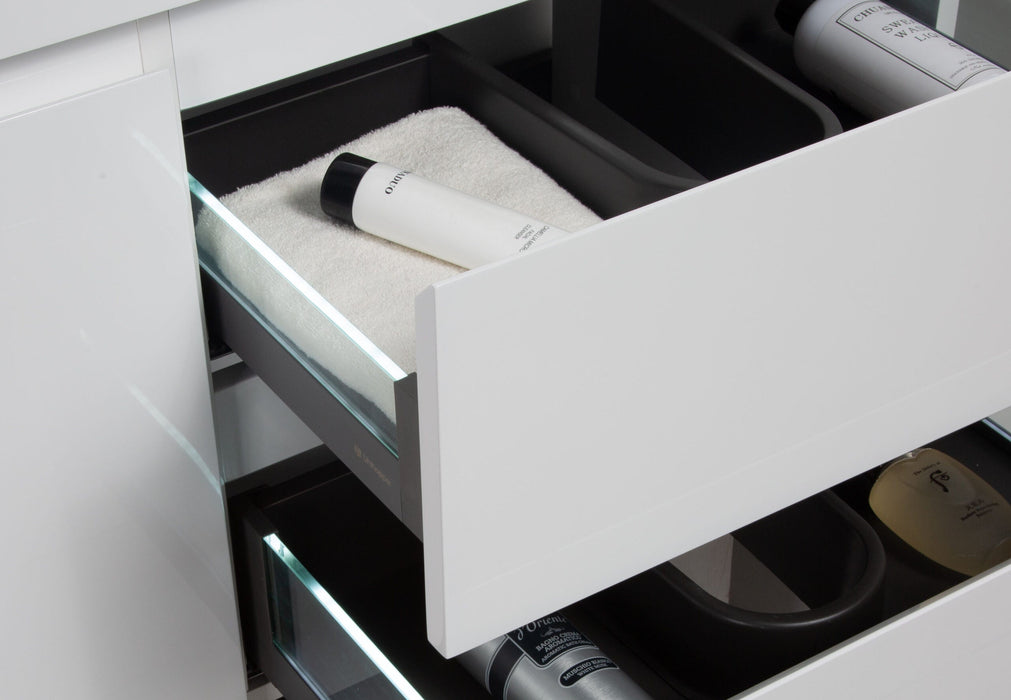 Open vanity drawer with cosmetics and toiletries.