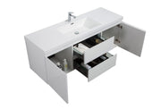 White bathroom vanity with open doors and drawers revealing storage.