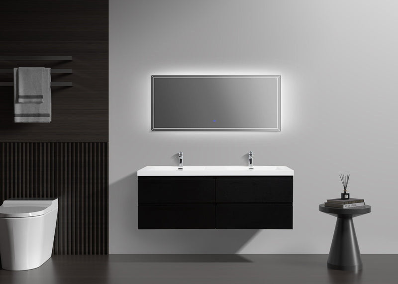 Bathroom with double sink, illuminated mirror, toilet, towel rack, and side table.