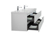 White bathroom vanity with two sinks and open drawers.
